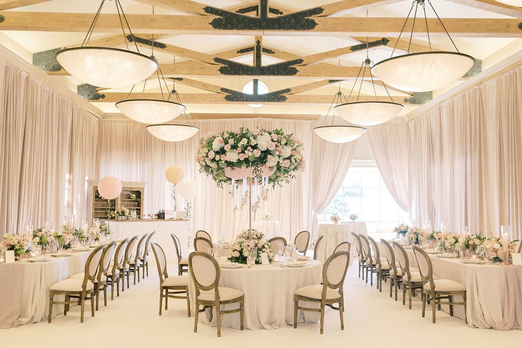 Elegant baby shower with towering blush floral centerpiece | PartySlate