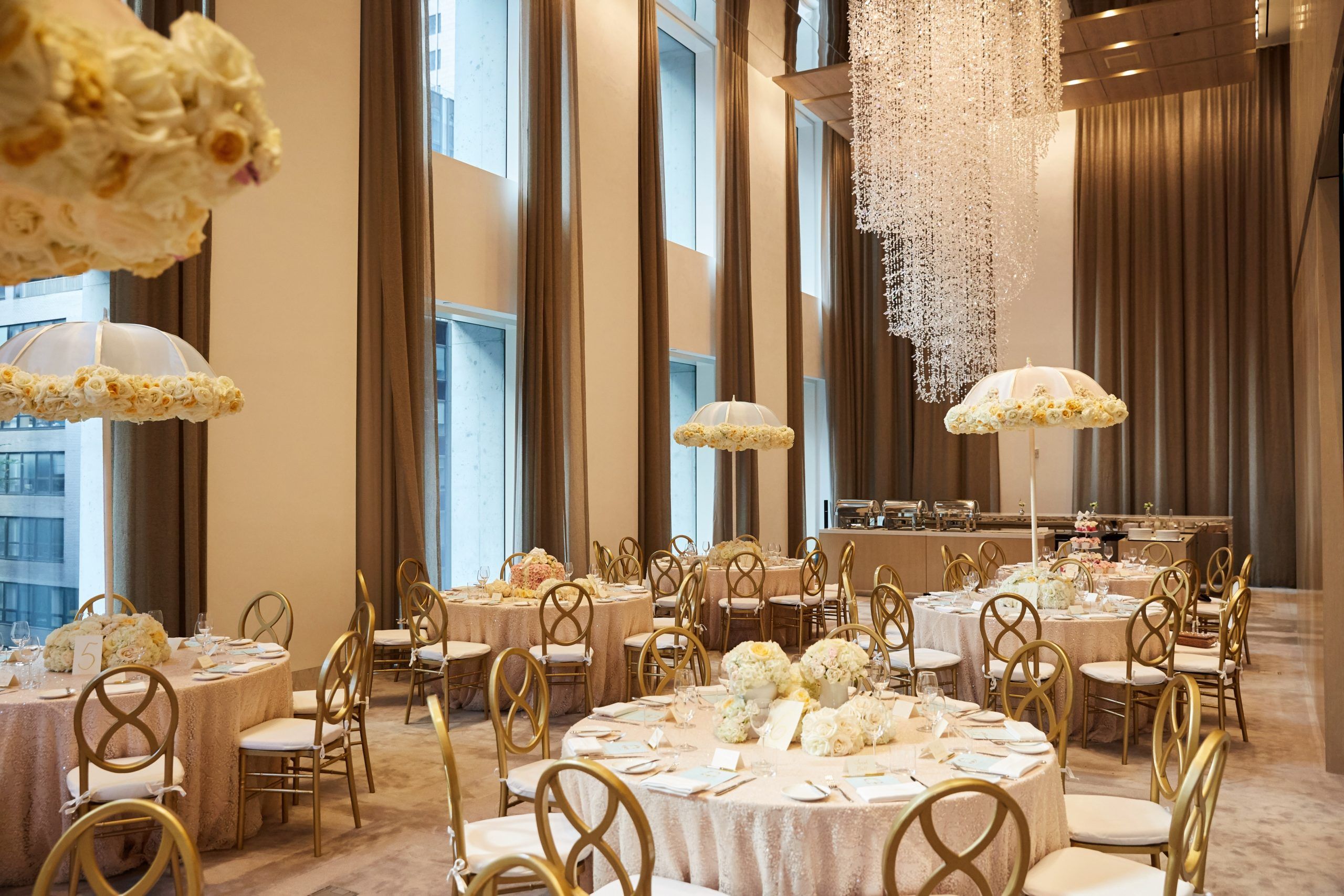 Elegant baby shower with umbrella centerpieces | PartySlate