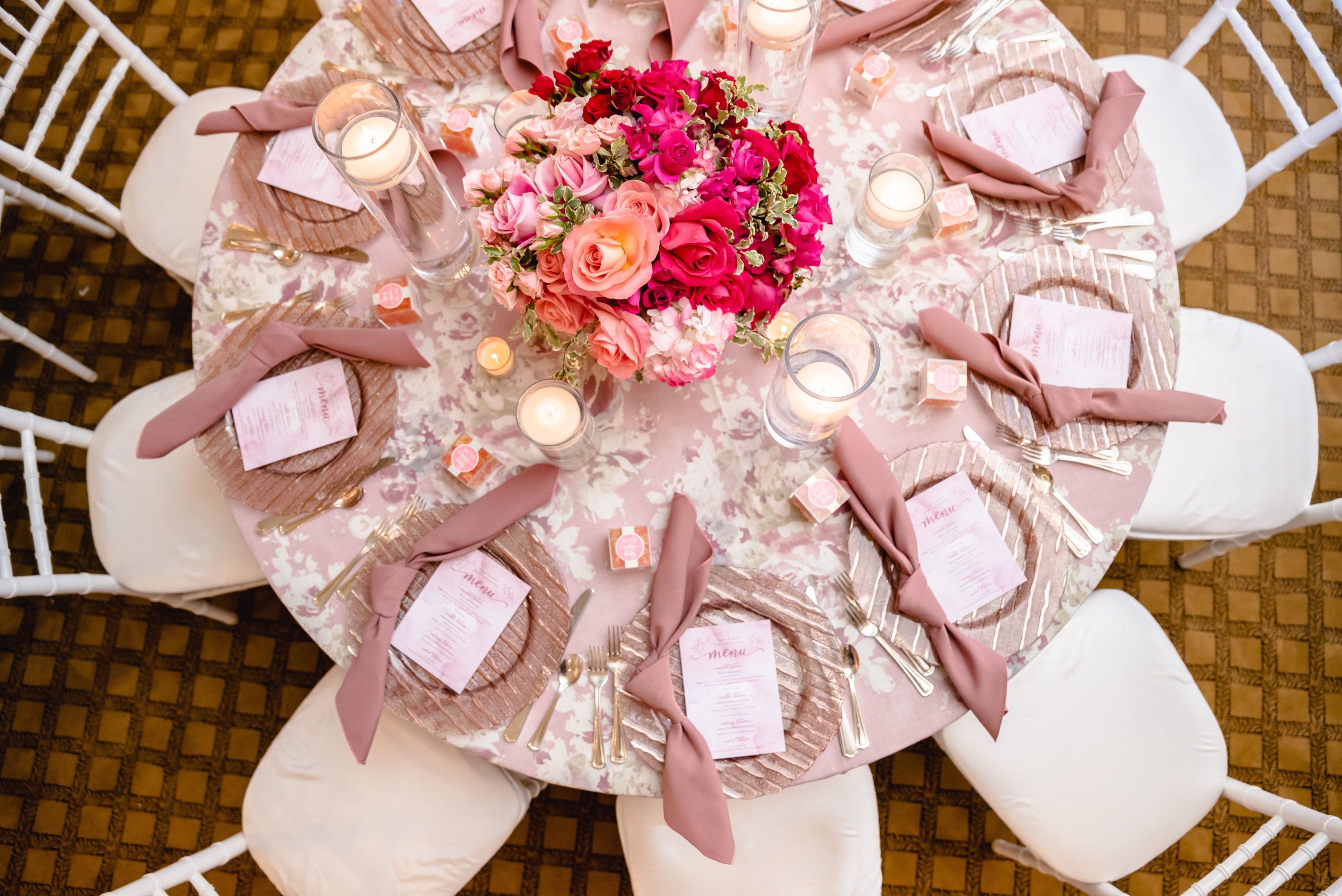Pretty in pink baby shower with pink floral centerpieces | PartySlate