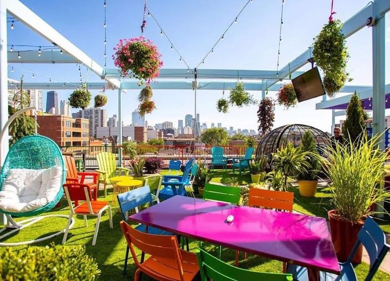 Outdoor rooftop event with colorful furnishing