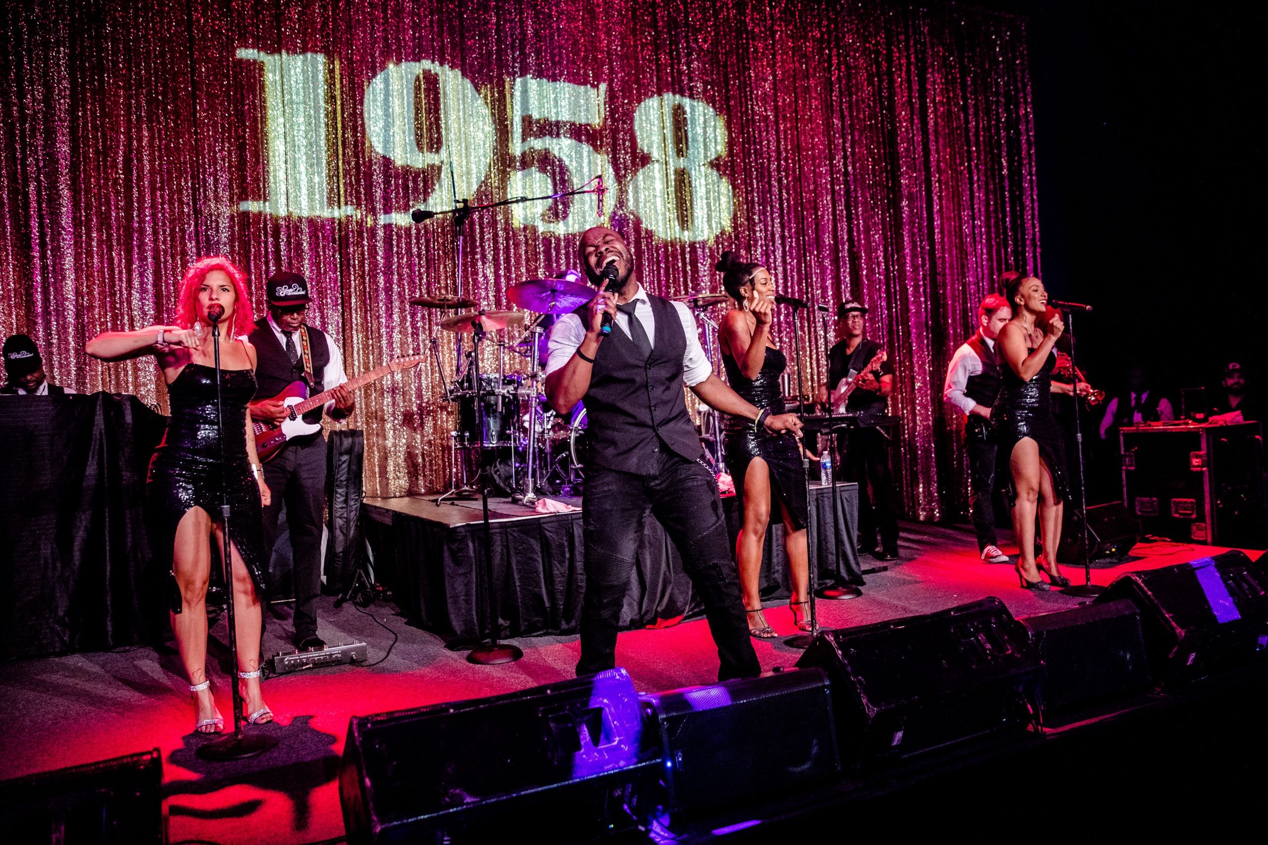 live band at 1958 themed 60th birthday party on stage | PartySlate