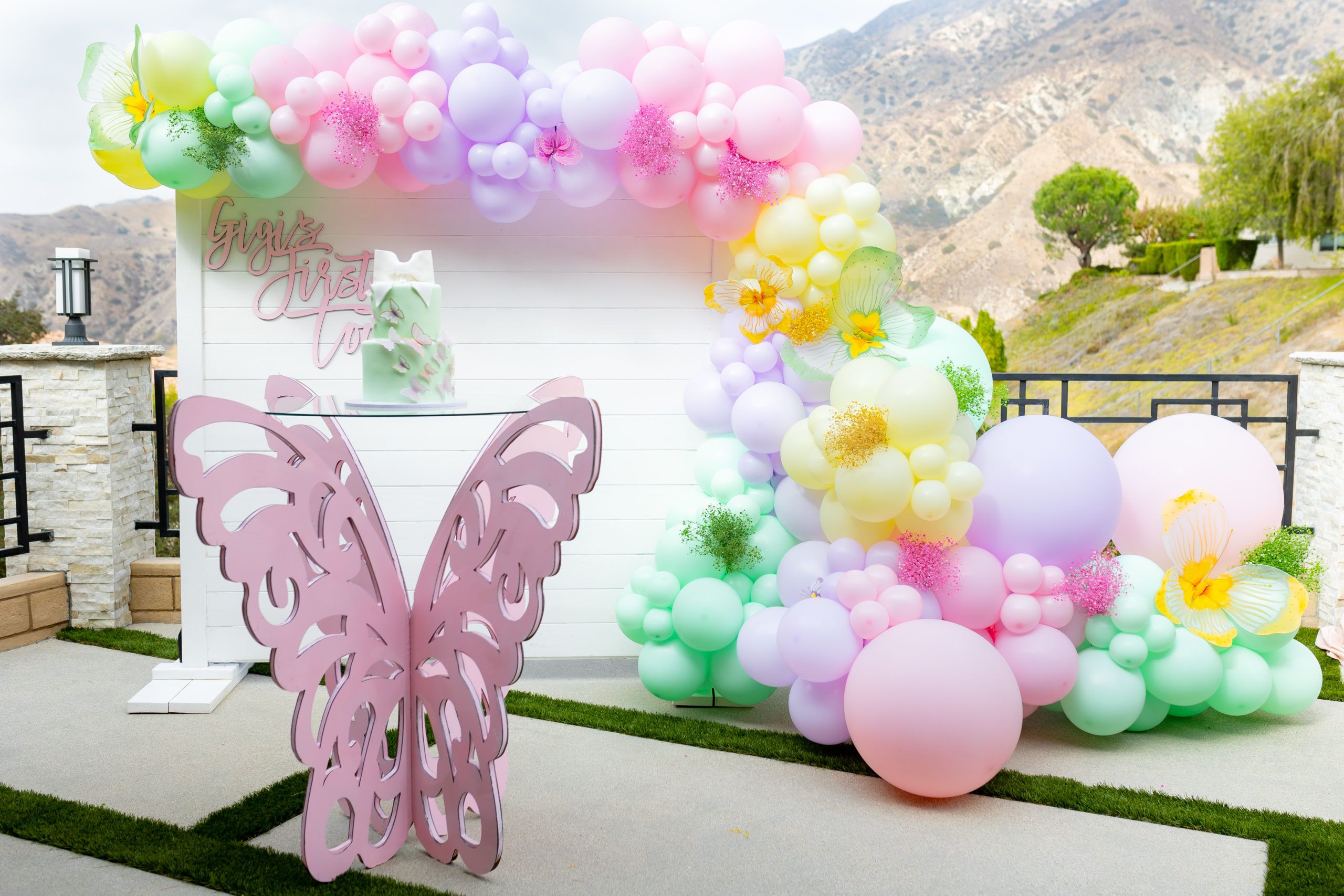 Butterfly Tooth Party with multi colored balloons and butterfly table | PartySlate