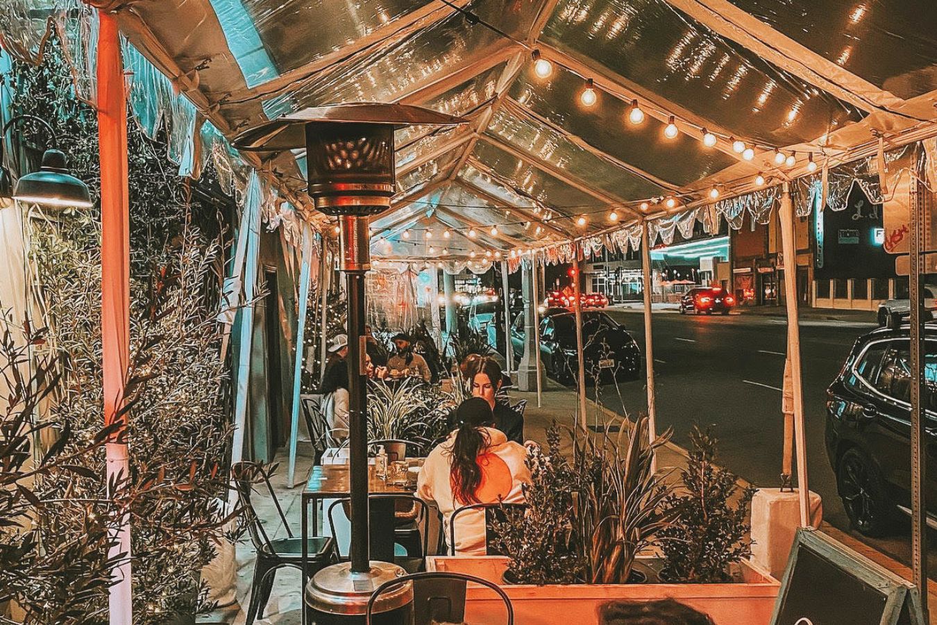 Outdoor patio event space at Candela La Brea at night | PartySlate