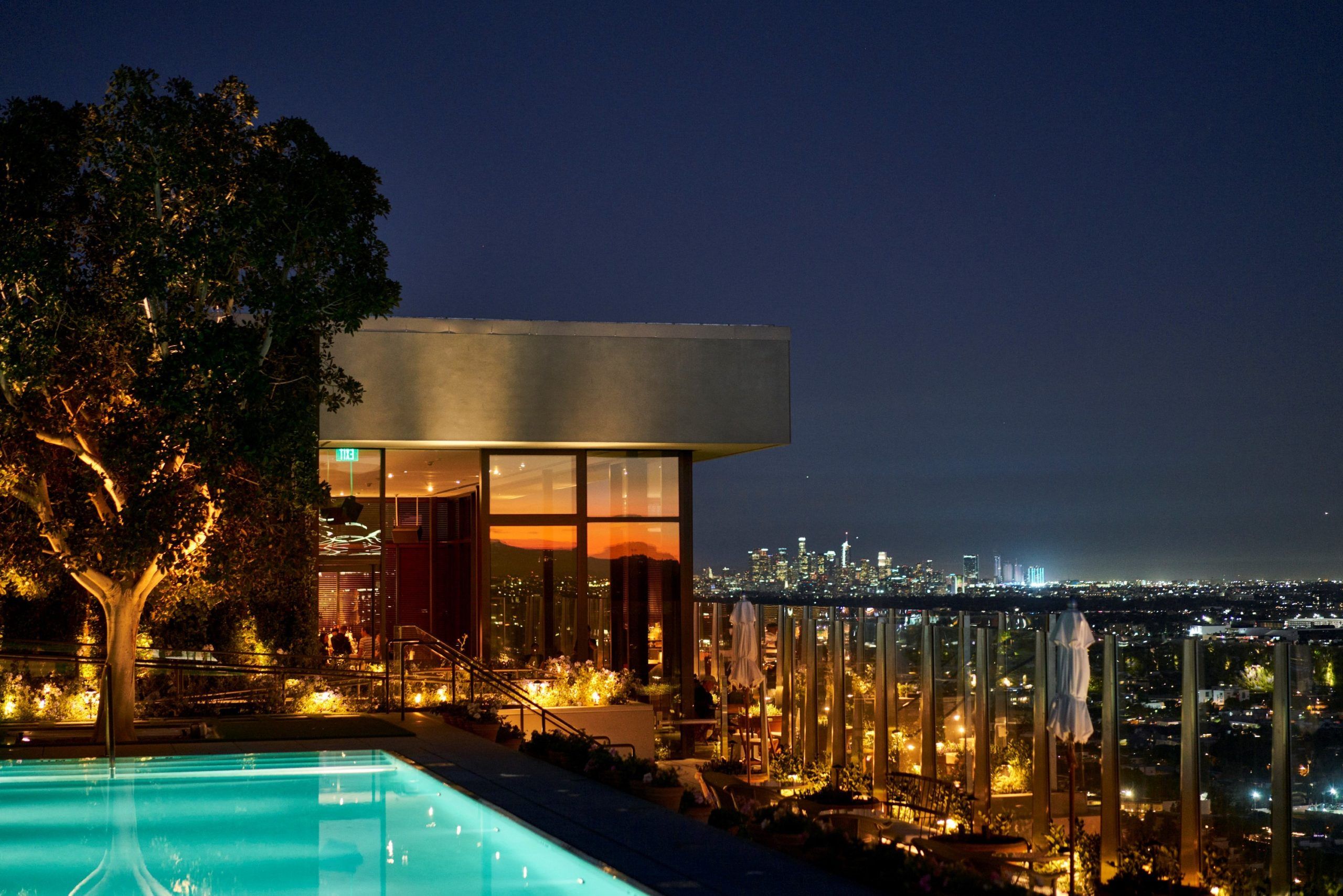 the rooftop of The West Hollywood EDITION at night with the skyline in the background | PartySlate