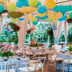 Rain themed baby shower with umbrella ceiling décor | PartySlate