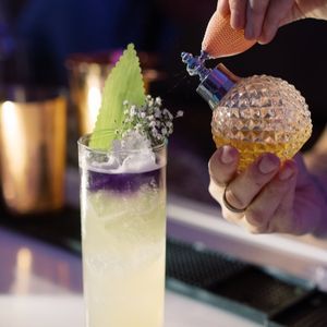 Cocktail with perfume spritz | PartySlate