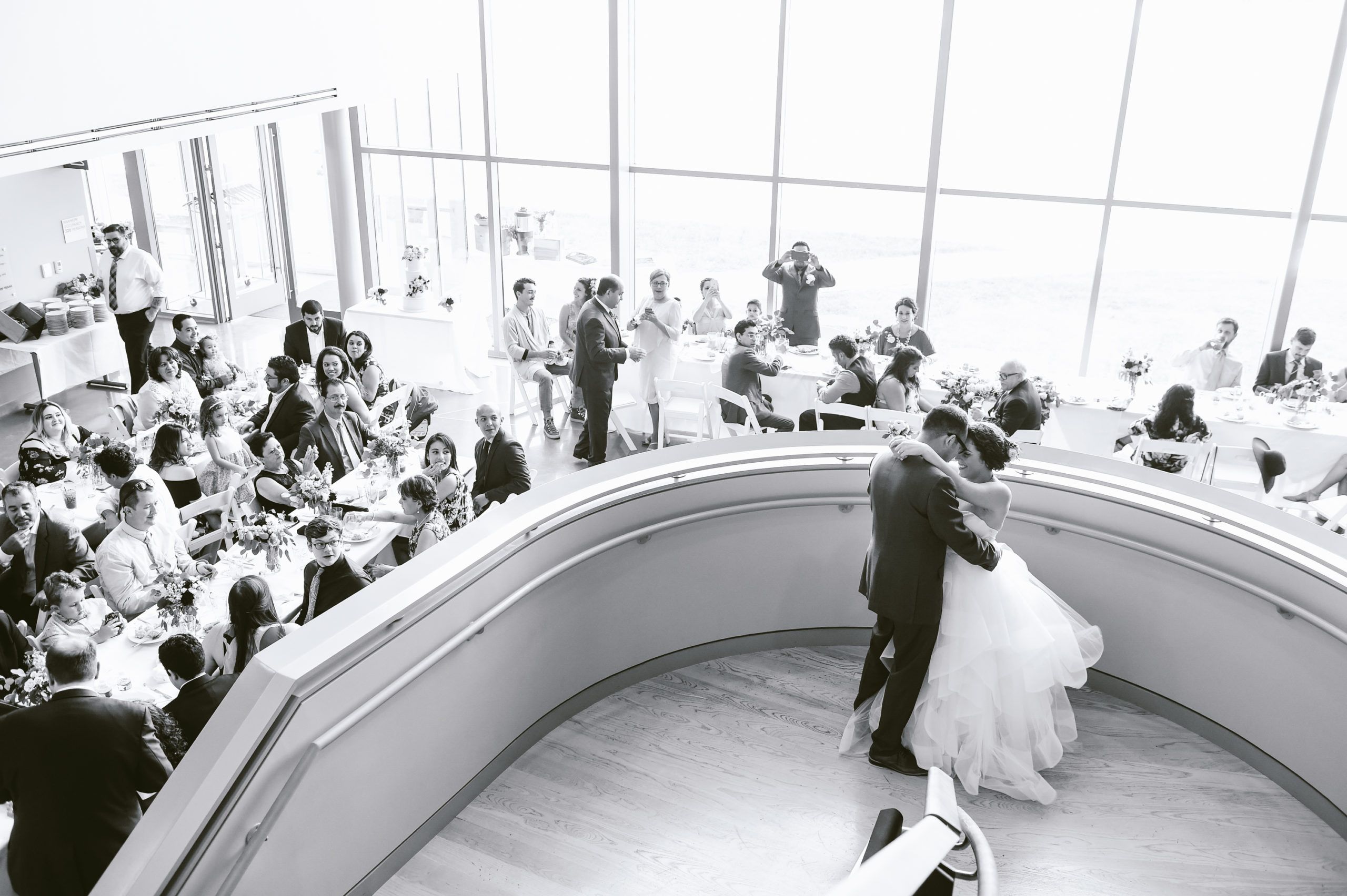 Botanical Research Institute of Texas (BRIT) wedding with couple standing in atrium | PartySlate