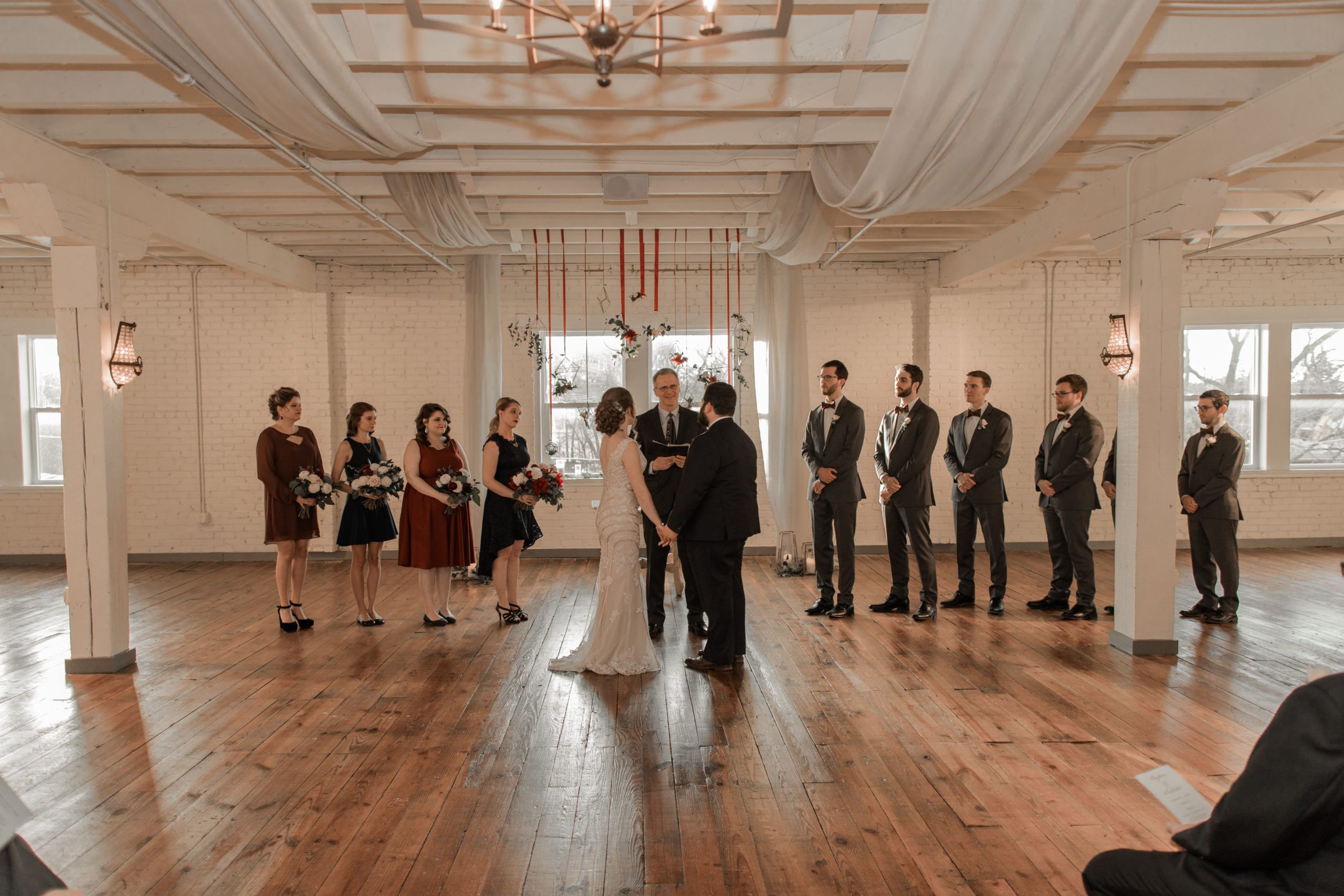 Rustic Red & Blue Wedding at Brik Venue in Fort Worth, TX | PartySlate