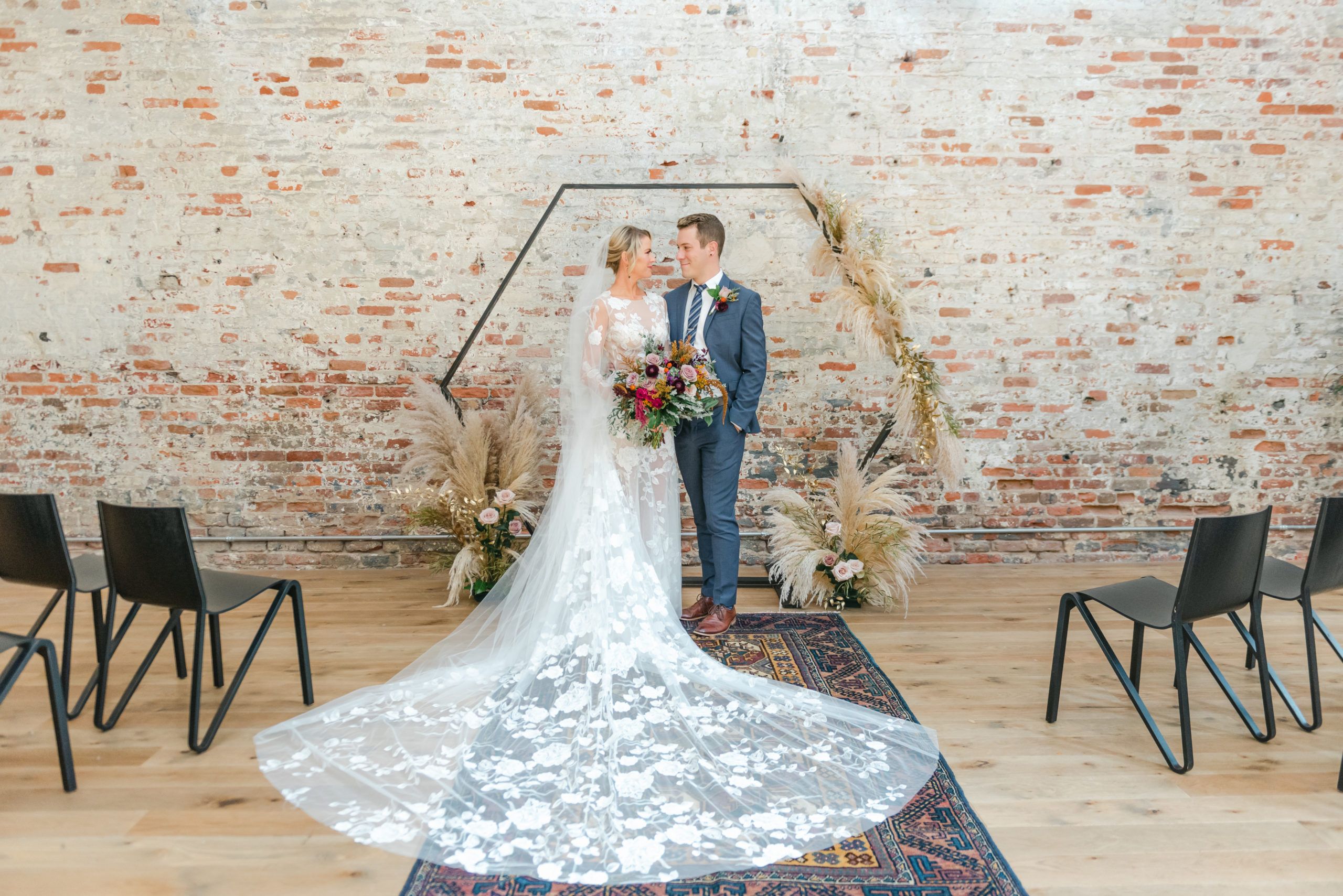 Intimate Bohemian Chic Wedding at Hanks Social Hall in Charleston, South Carolina | PartySlate