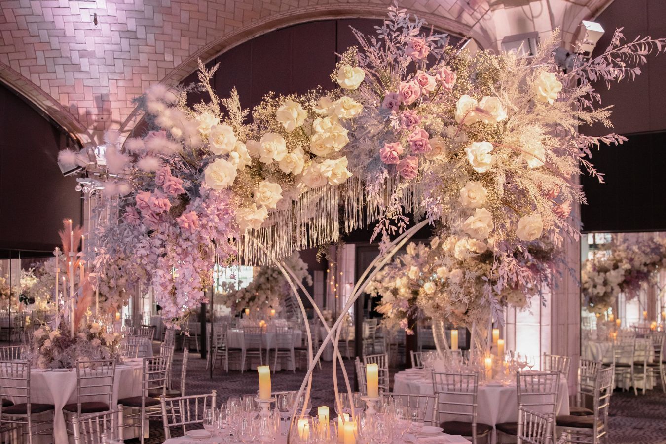 pastel boho towering wedding centerpiece | PartySlate