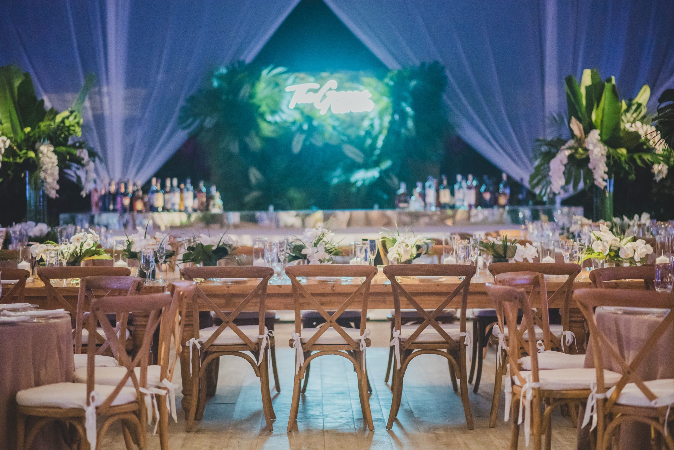 Romantic Glam Bahamas Wedding with neon bar sign | PartySlate