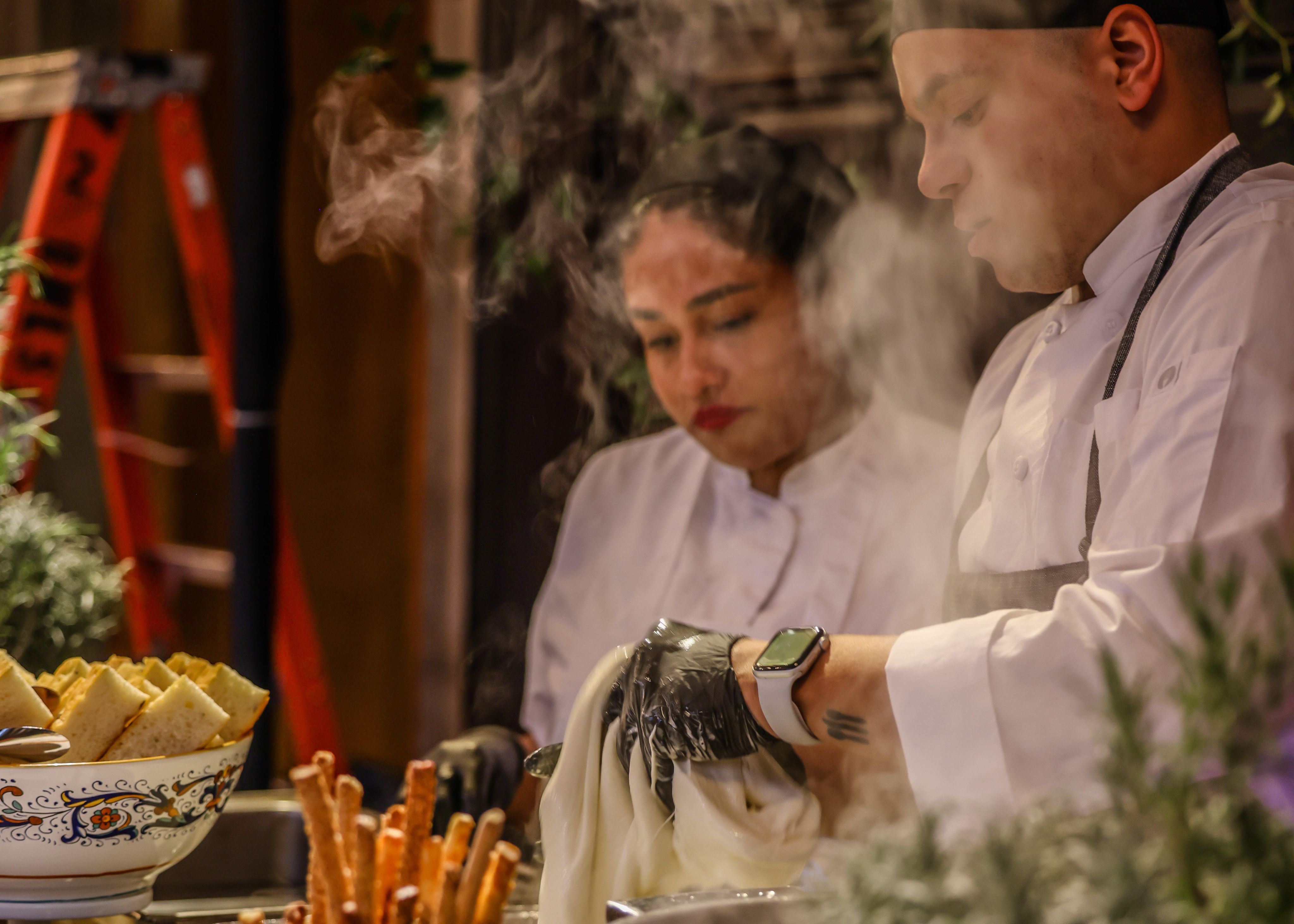 Chefs preparing a meal.