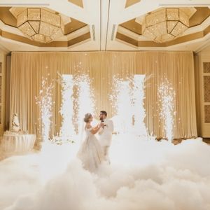 Fairytale wedding first dance with swirling fog.
