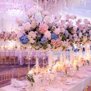 Pink and blue floral wedding centerpieces at ballroom wedding.
