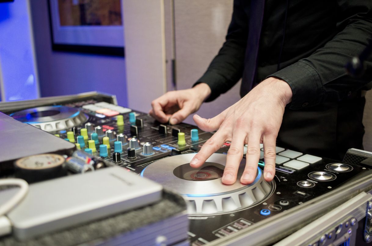 Colorful Ballroom Wedding at Hilton Fort Lauderdale Beach Resort with a DJ performance by Parisi Events and Productions.