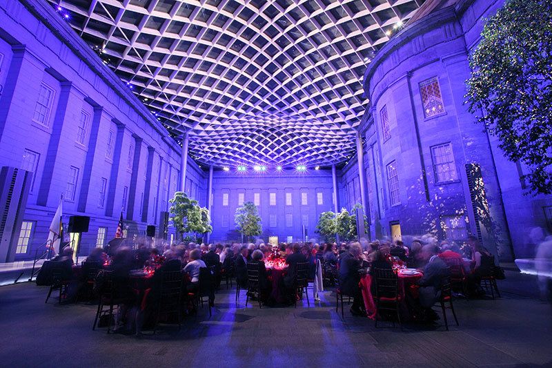 Event at Smithsonian National Portrait Gallery with purple uplighting.