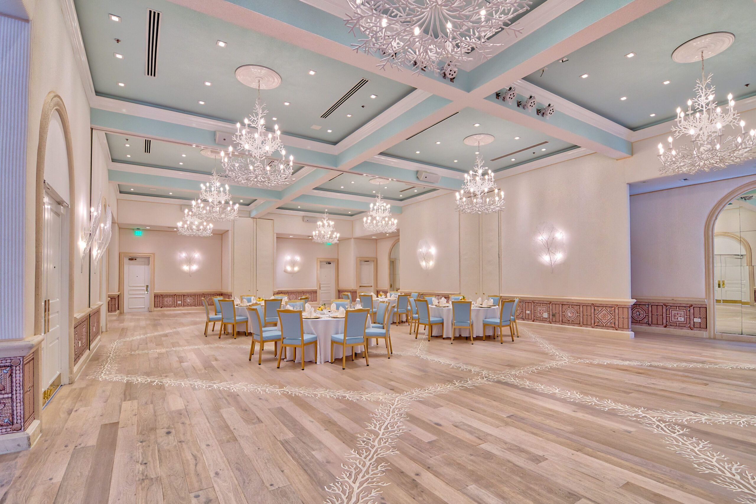 Coral Ballroom in pastel hues at The Colony Palm Beach, a Palm Beach wedding venue.