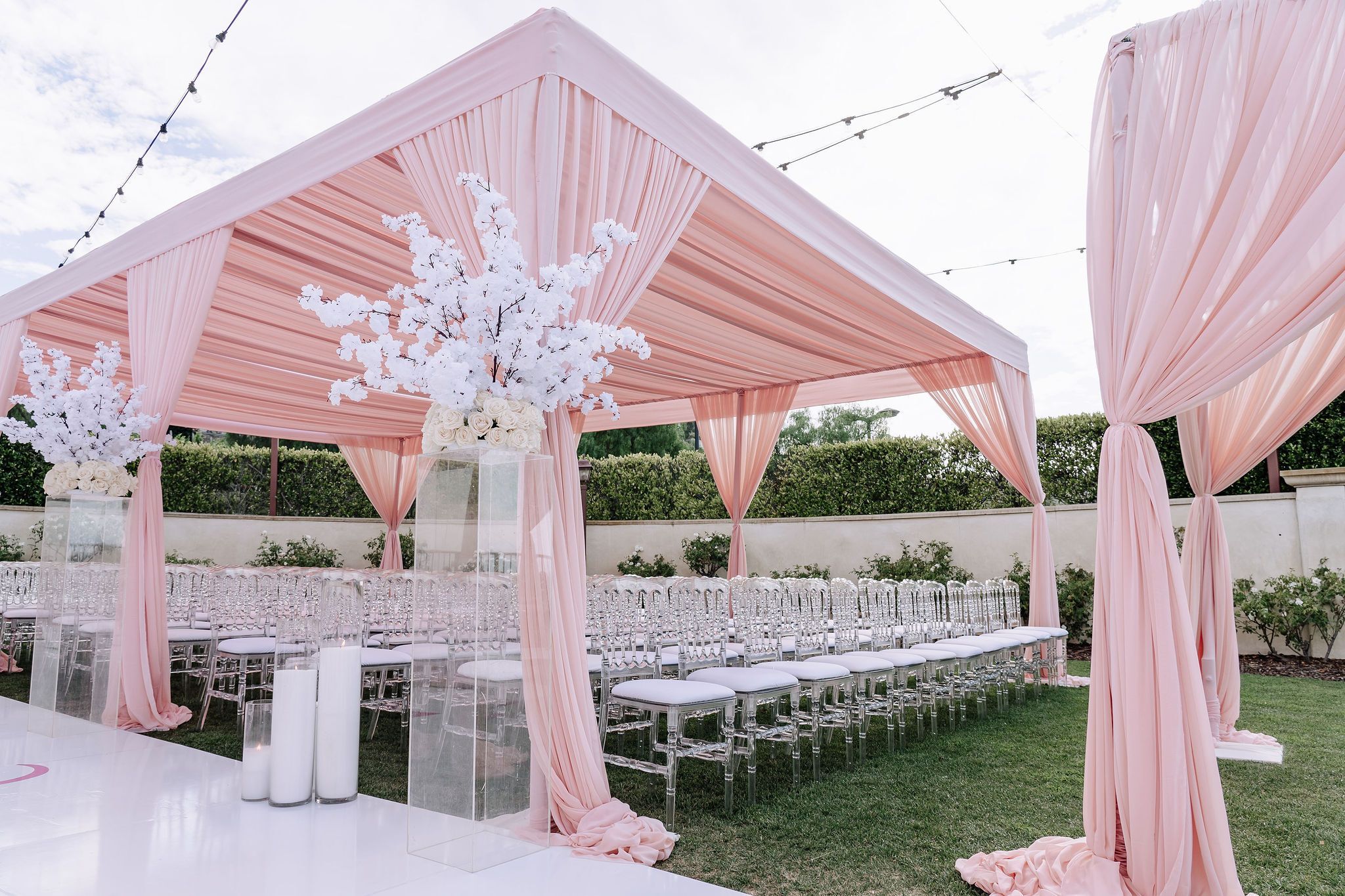 Pale pink wedding ceremony tent