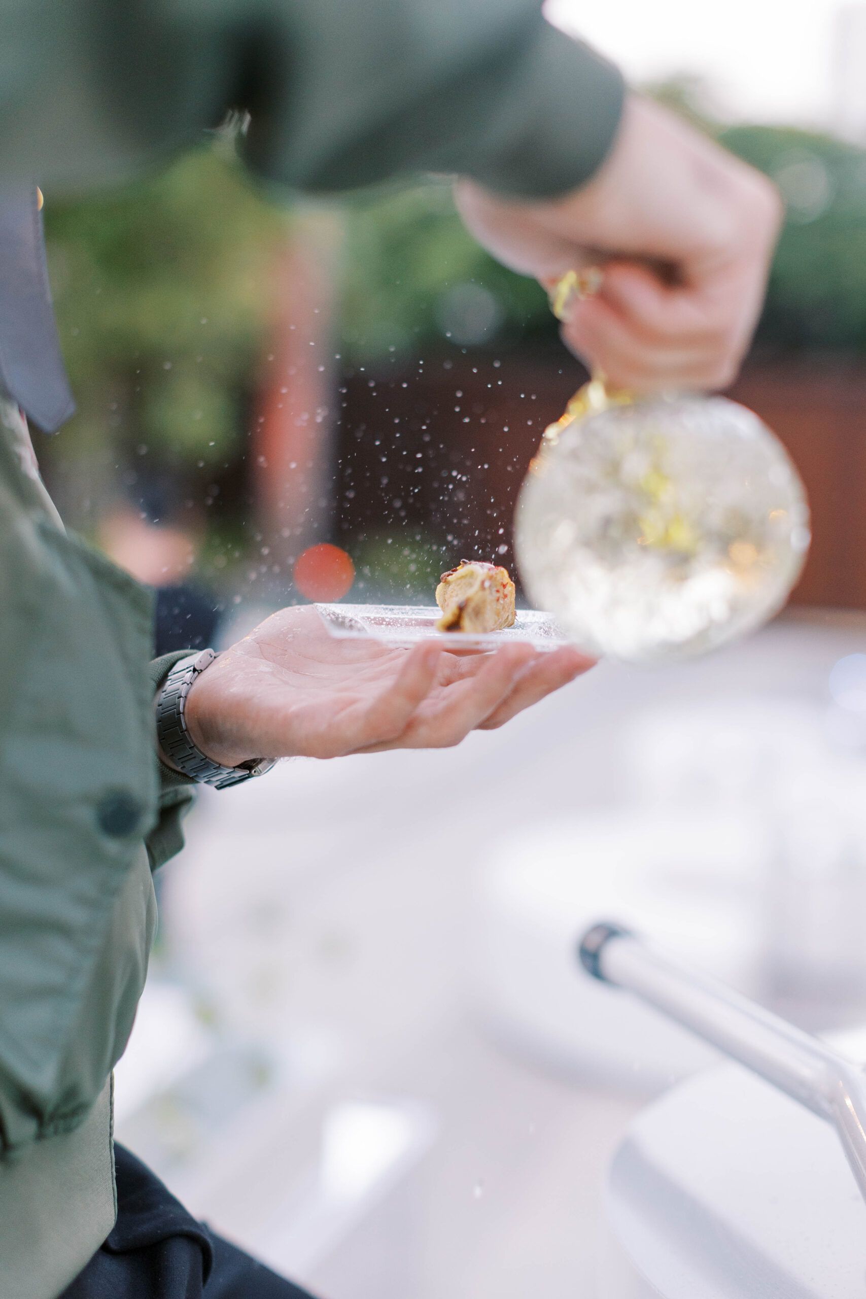 Powder being put on food