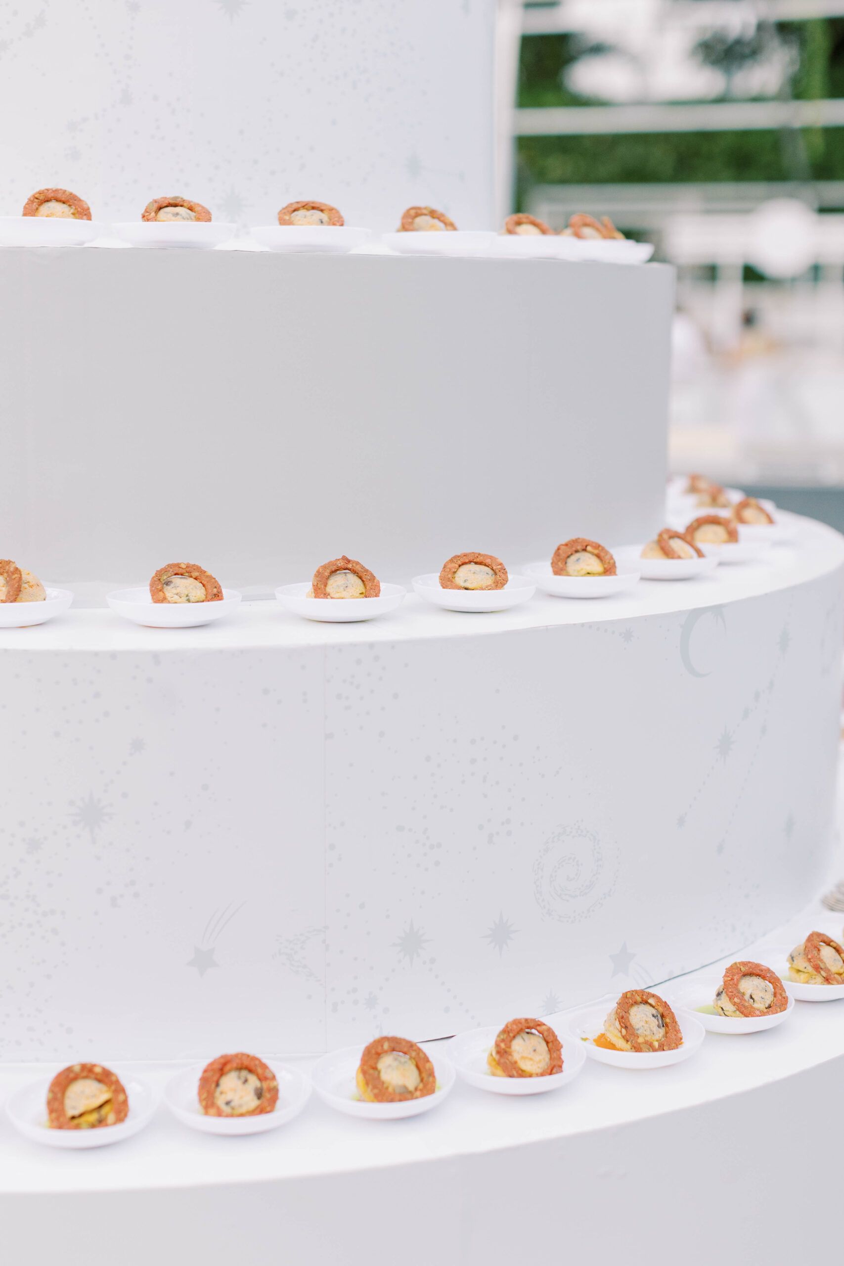 A three-tiered food stand