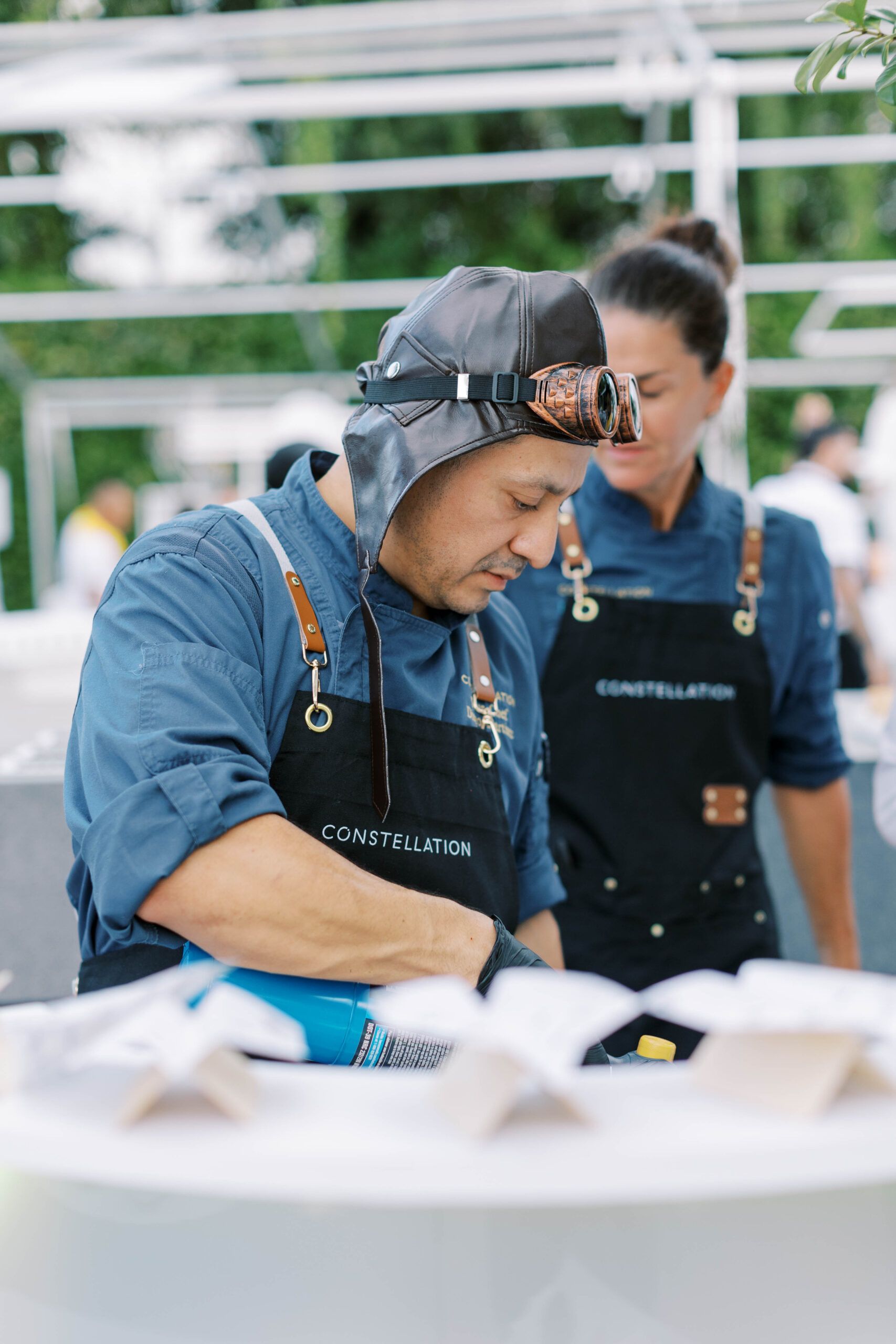 A man with constellation apron