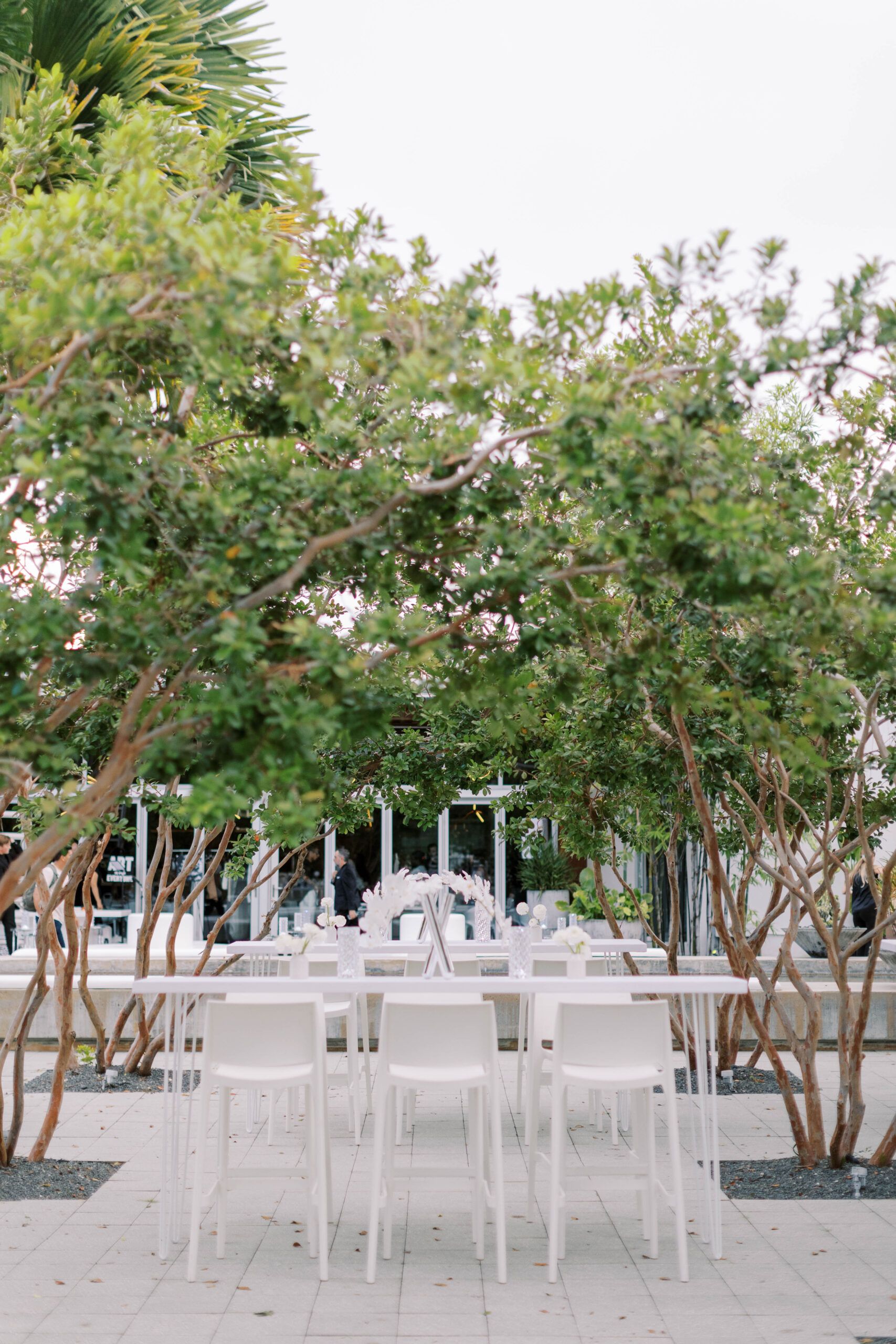 White table furnishing within trees