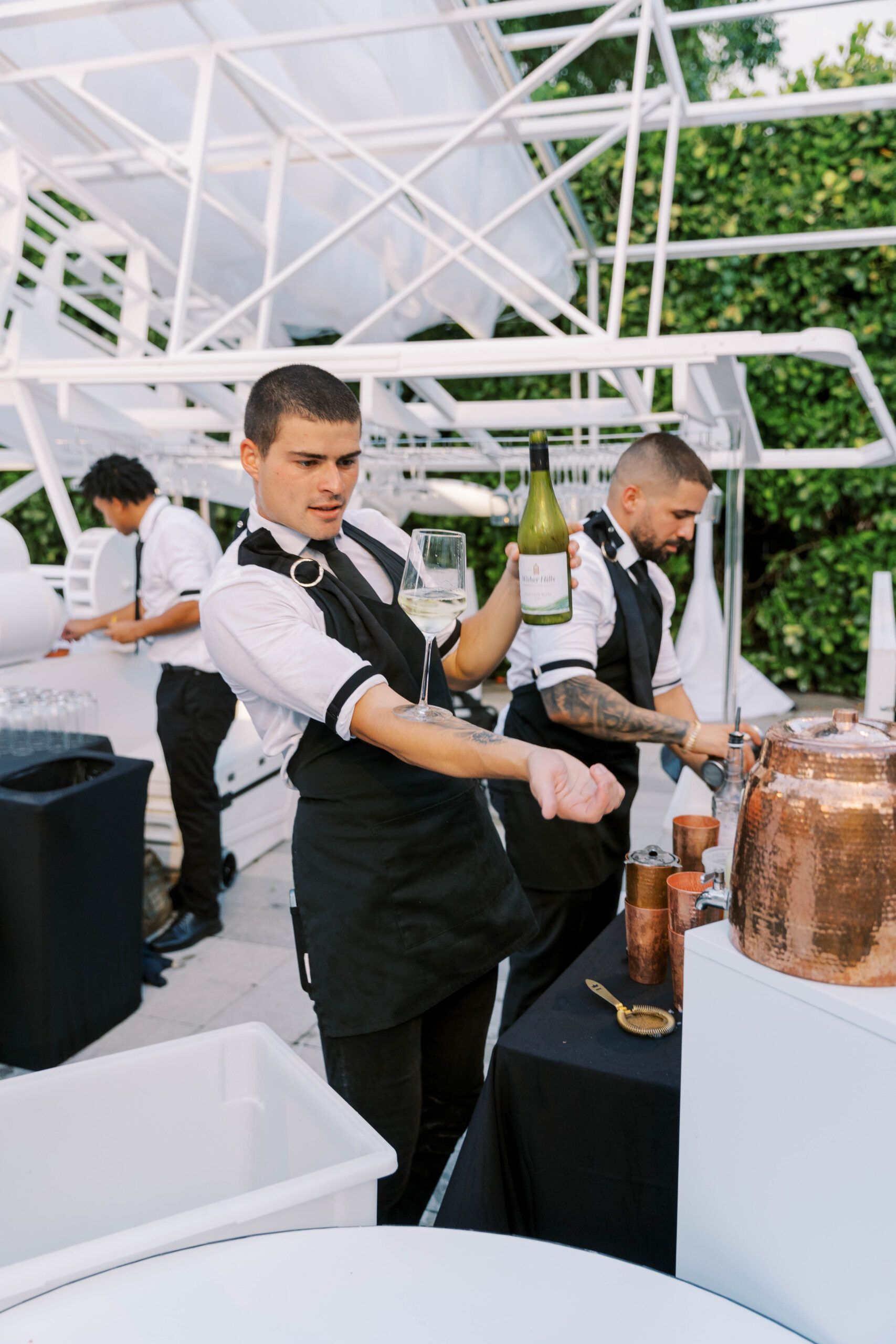 Mixologists making drinks