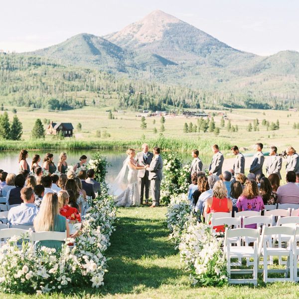 Dreamy summer wedding ceremony in the mountains.