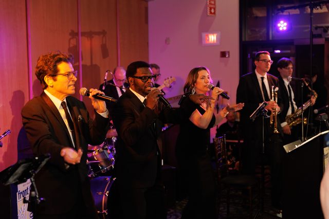 Featured photo from See This Elegant Wedding at Independence Grove Forest Preserve with Vibrant Onstage Performances and a Joyful Dance Floor