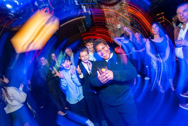 Featured photo from Celebrate This New York Bar Mitzvah at a Skyline Lounge with Hanging Basketball Jerseys and a Hoop Shoot Arcade