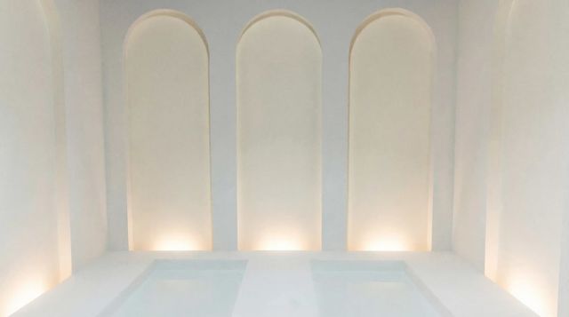 Featured photo from Sculptural White Studio with Architectural Curves