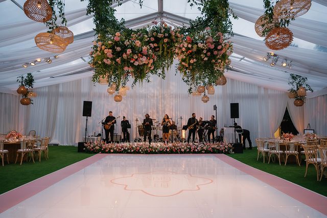 Featured photo from Gather for This Rancho Santa Fe Wedding with a Transparent Canopy and Dramatic Overhead Blooms