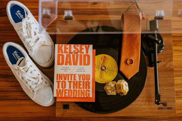 Featured photo from An Industrial-Chic Wedding at Garage B Events at The Speedway with Bright Florals and Banquet-Style Tables