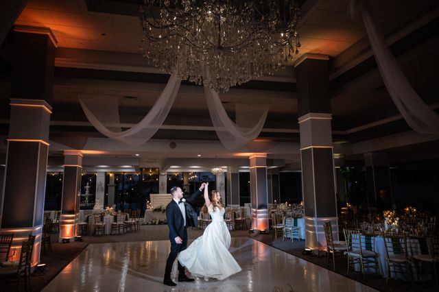 Featured photo from A Boca Lago Wedding with Cascading White Florals, Candlelit Tables, and a Dramatic Ballroom Reveal