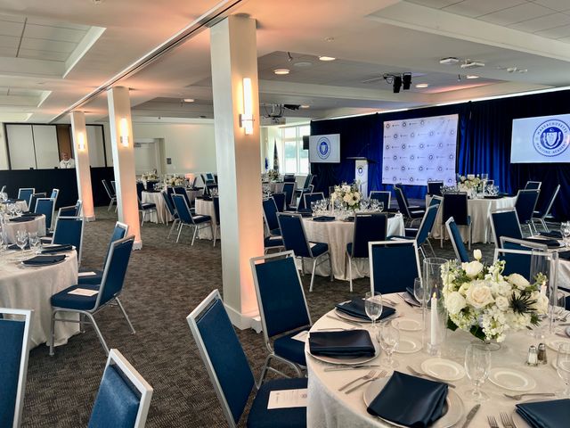 Featured photo from Celebrate This Waterfront Gala in Buzzards Bay, MA with a Tented Reception and Classic Blue-and-White Tablescapes