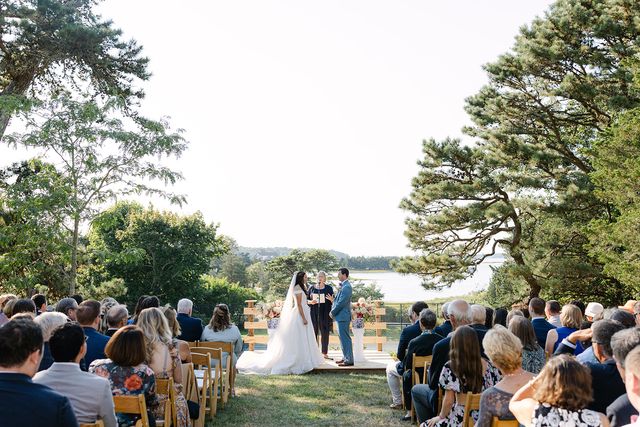 Featured photo from See This Coastal Outdoor Wedding in Plymouth, MA with a Waterfront Ceremony and Elegant Tented Reception