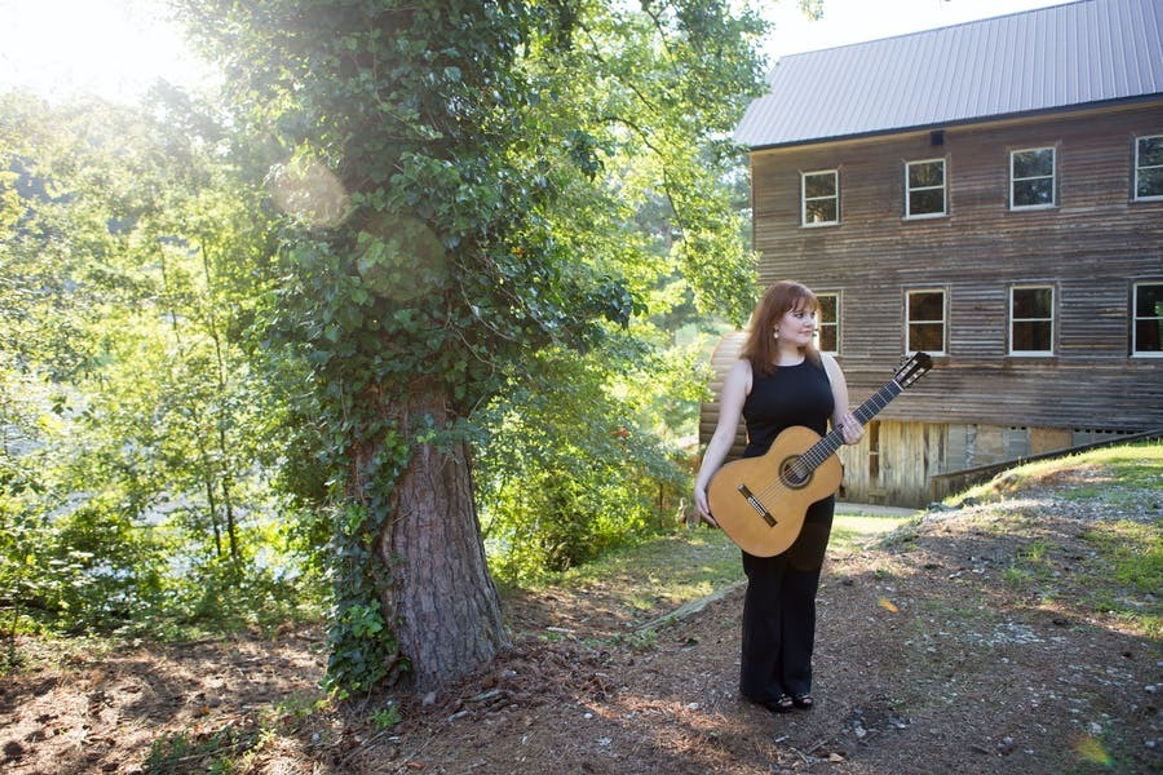 Cover photo of Krystin O'Mara, classical guitarist