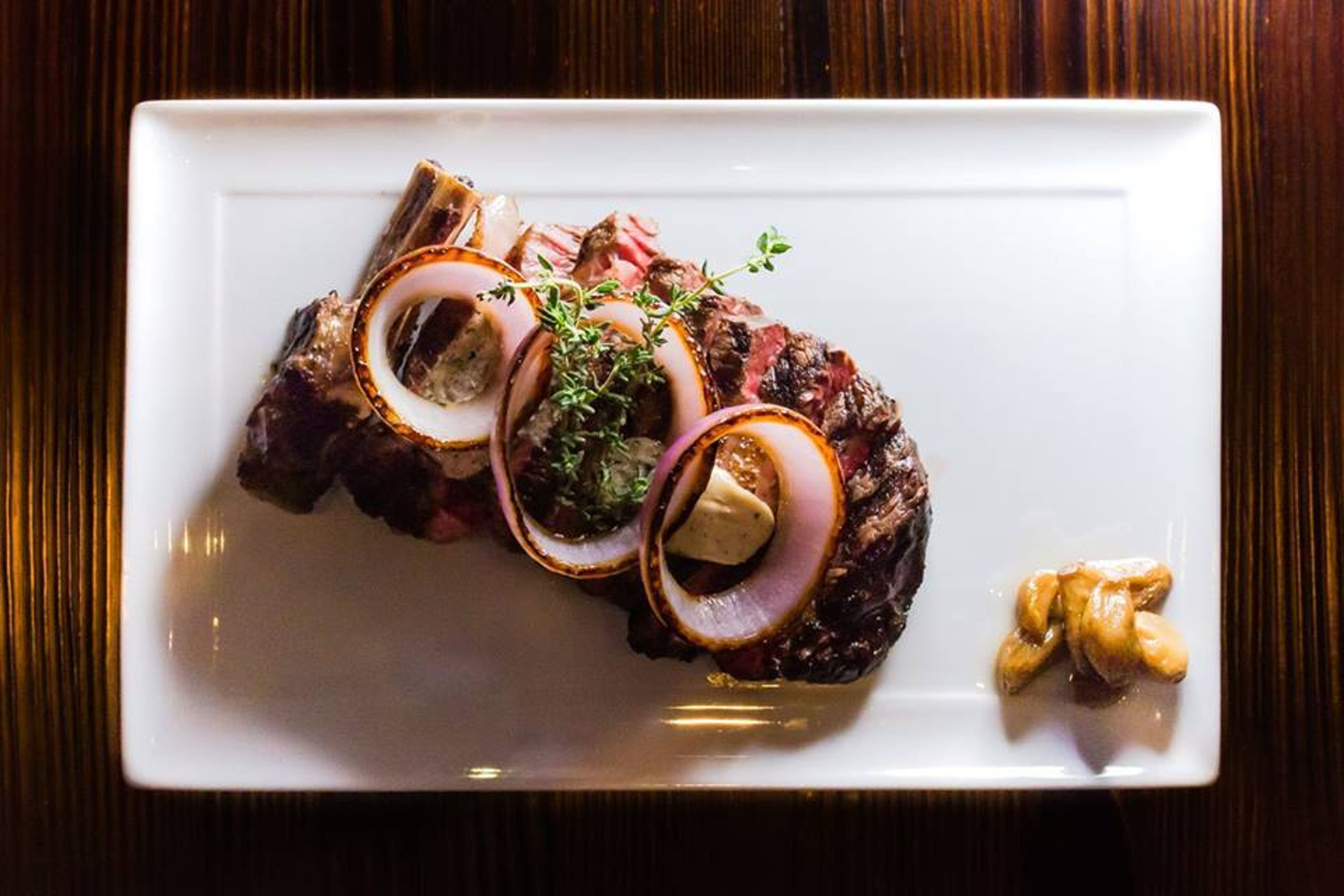 Cover photo of The District by Hannah An