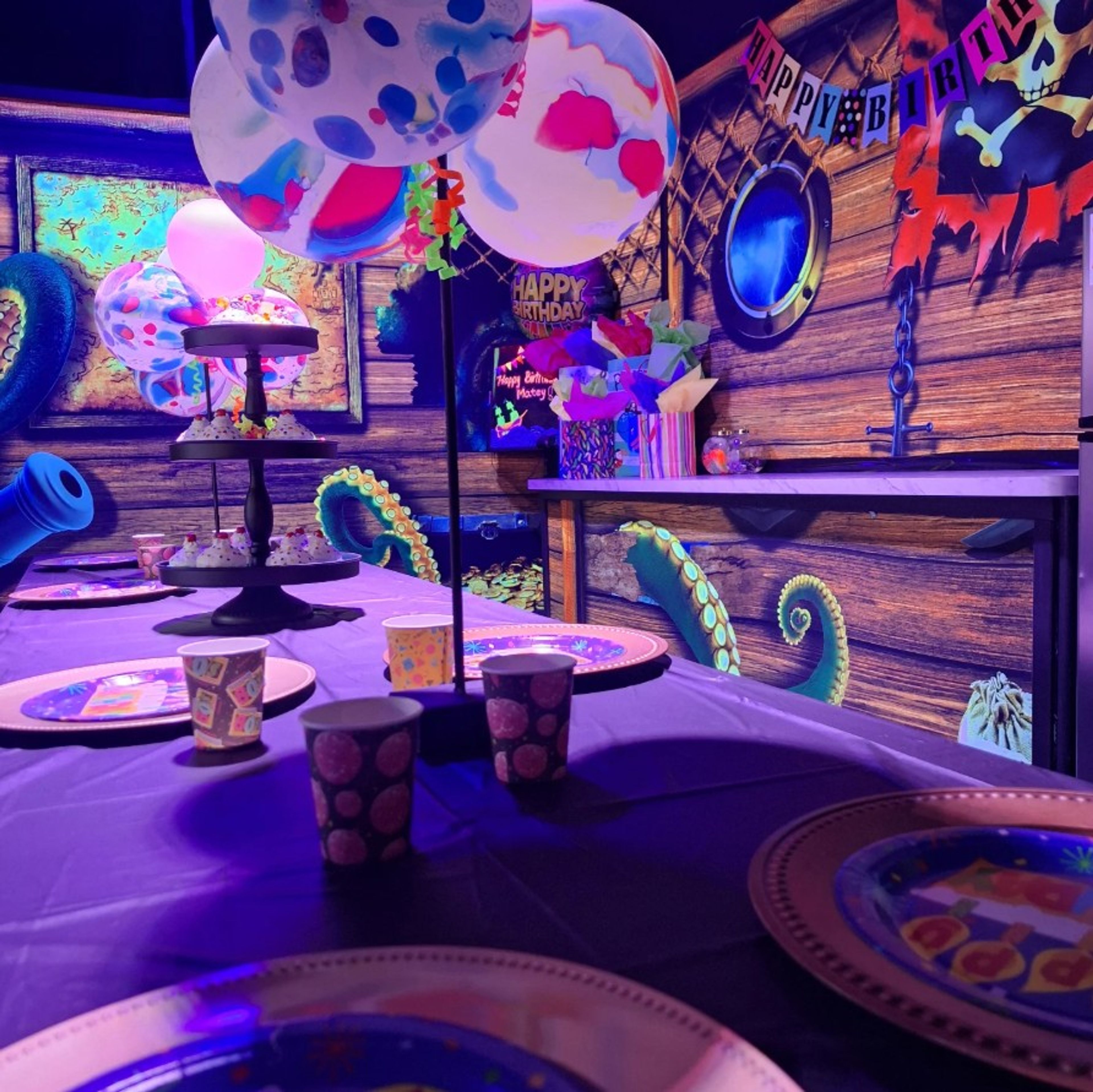 Cover photo of Cutthroat Cove Blacklight Mini Golf