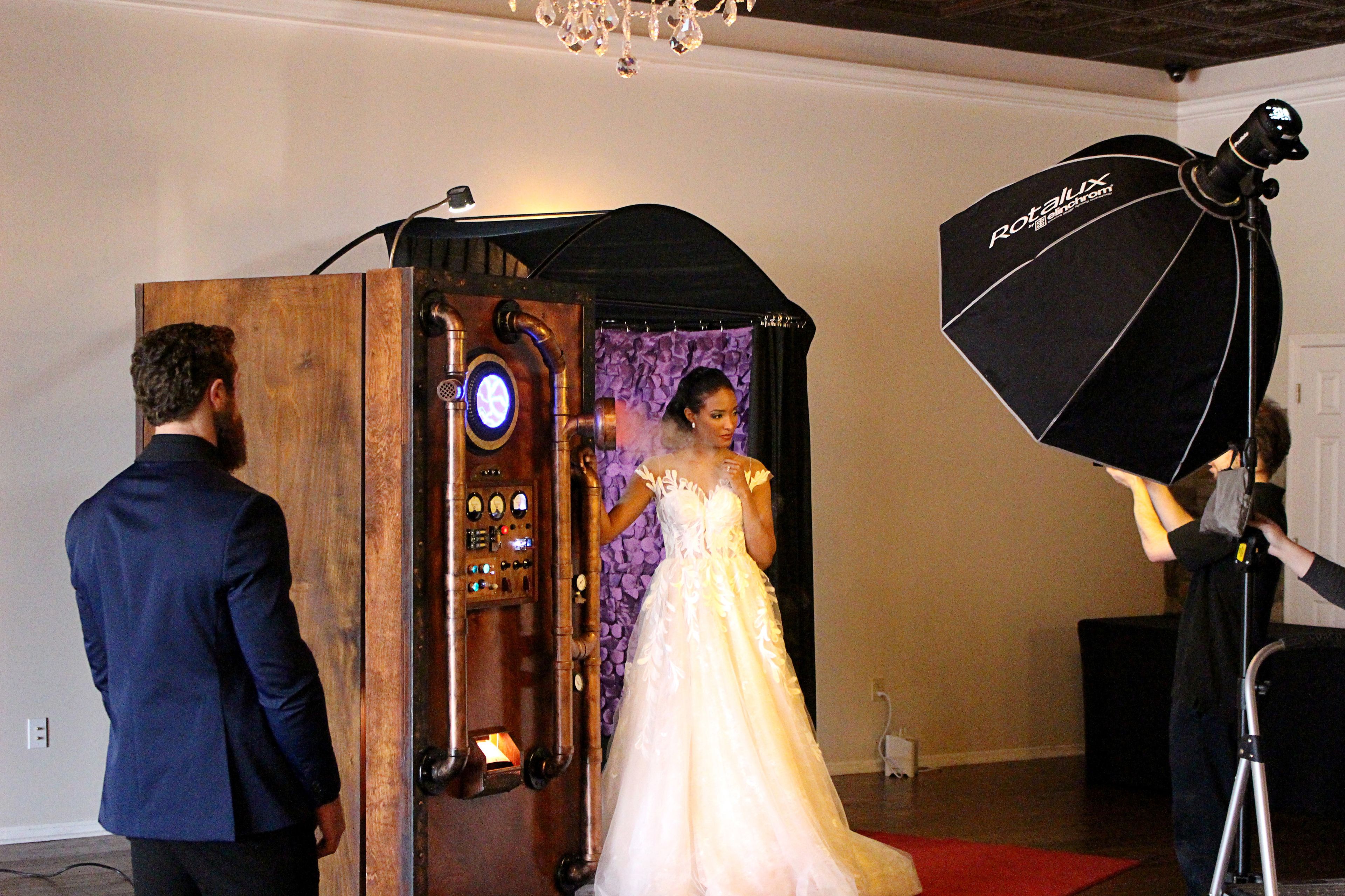 Cover photo of The Looking Glass Photo Booths