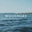 Logo for The Woodmark Hotel & Still Spa