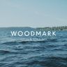 Logo for The Woodmark Hotel & Still Spa