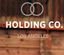 Logo for The Holding Co