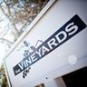 Logo for The Vineyards