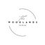 Logo for THE WOODLANDS VENUE