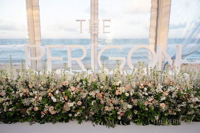 Featured photo from Witness This Miami Opening Party with a Floral-Lined Oceanfront Stage and a Luxury Brand Reveal