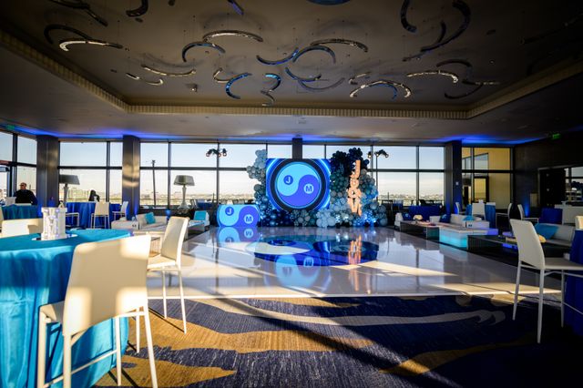 Featured photo from Discover This Modern B’nai Mitzvah at Marina del Rey Marriott Featuring Yin-Yang Branding and Bold Blue Tablescapes