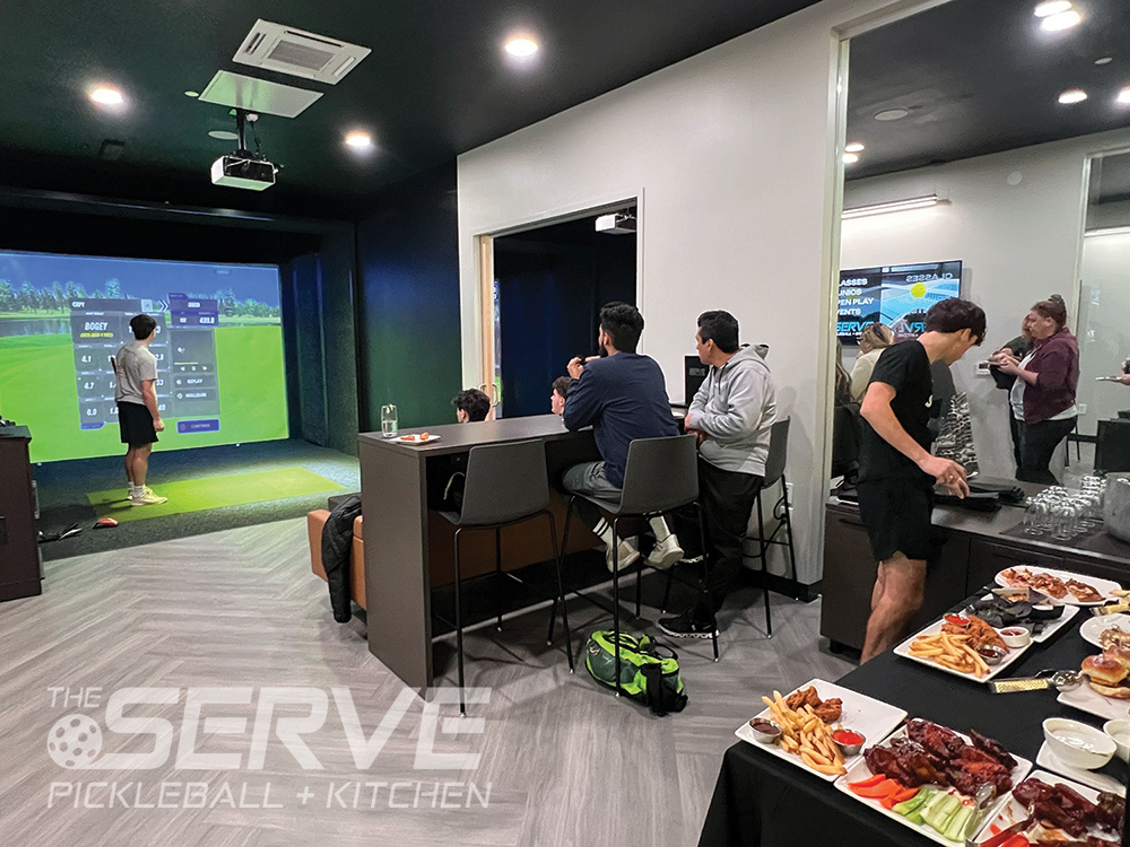 Topgolf Swing Suite Bays, an event space at The Serve Pickleball + Kitchen