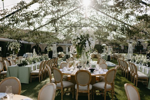 Featured photo from This Al Fresco Wedding at Del Mar Fairgrounds Was Meant To Be with White Florals and Sunlit Reception Seating