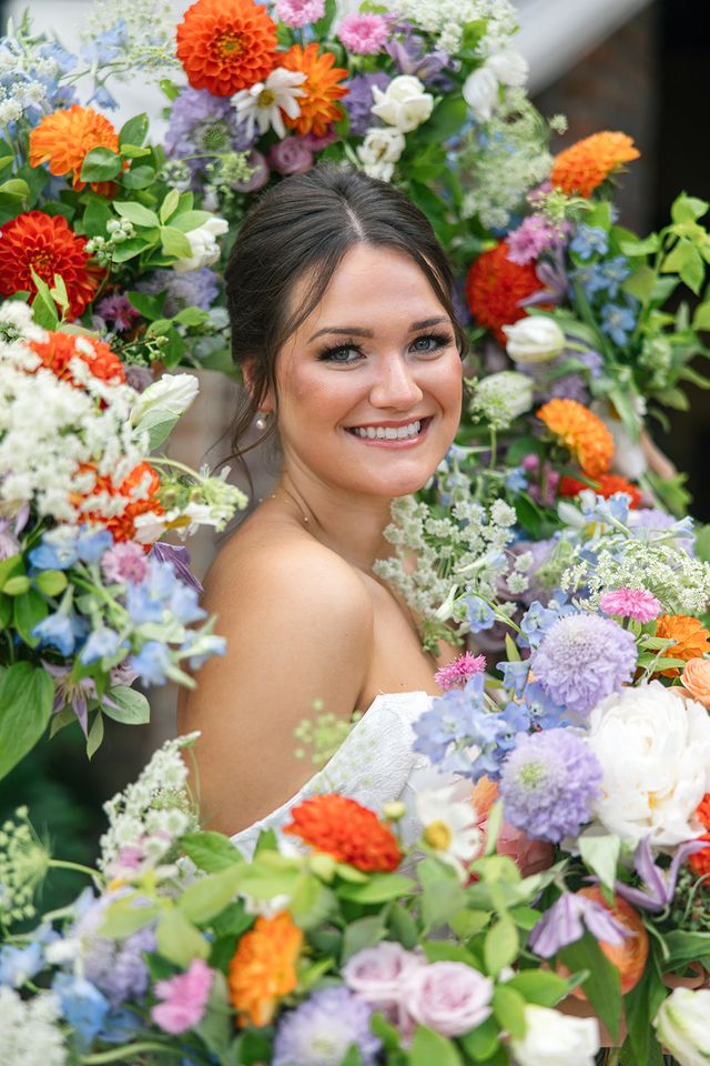 Featured photo from Take In This Floral-Forward Wedding with Abundant Ceremony Arrangements at the Historic Rice Mill